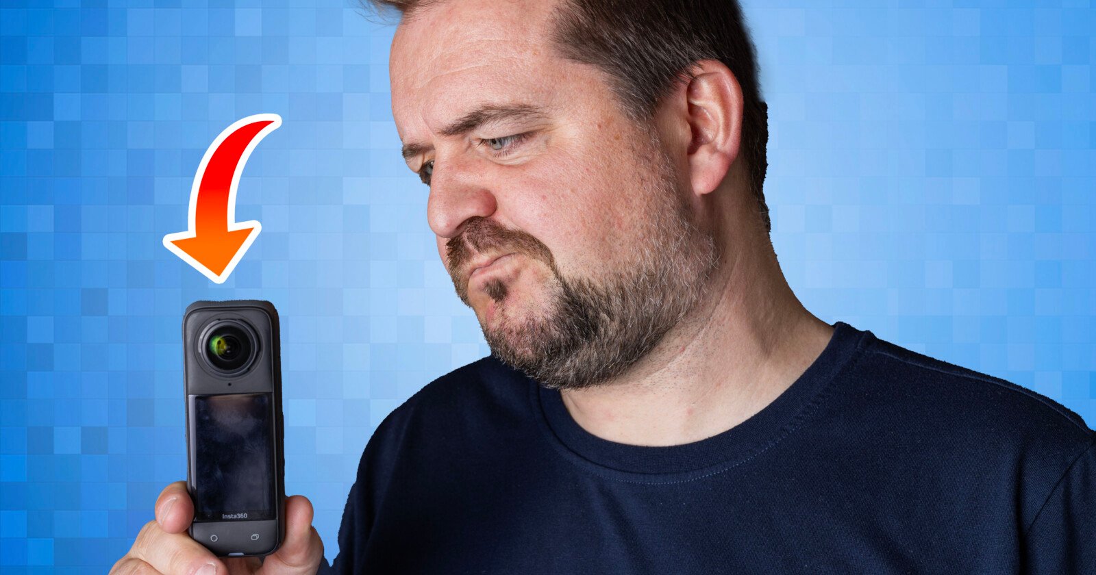 A man with a beard appears skeptical while looking at a small handheld camera he is holding in one hand, with an arrow pointing to the camera against a blue background.