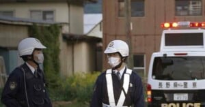 Photographer charged murder suspect's home trespassing japan Masanori Aoki