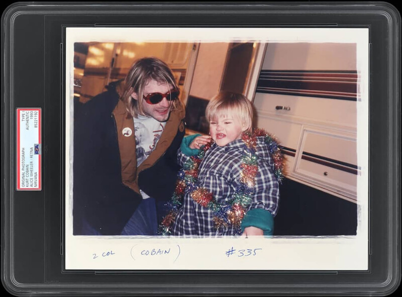 A photograph of late musician Kurt Cobain and his daughter Francis Bean Cobain.