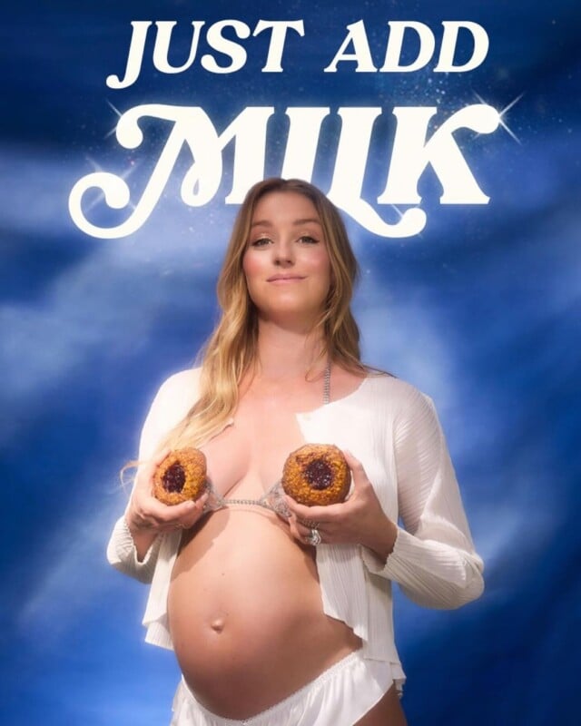 A pregnant woman in a white outfit holds two pastries over her chest. Above her, in white text, are the words "Just Add Milk" against a blue background.