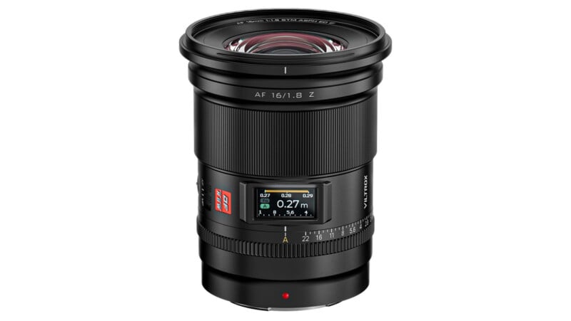 A modern camera lens with markings "af 16/1.8 z" and various focus distance indicators, featuring a black body with a red ring and detailed scales for aperture and focus adjustments.