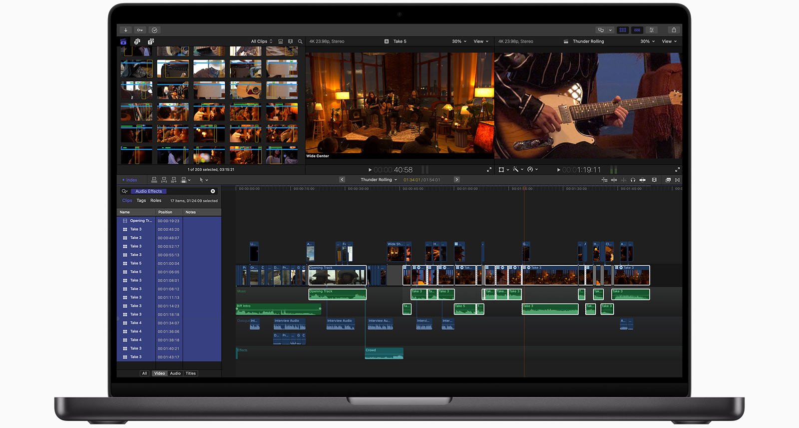 A laptop screen displaying video editing software with multiple video and audio tracks, showing thumbnails of a musician playing guitar in a dimly lit room.
