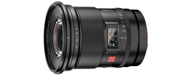 A high-resolution image of a black dslr camera lens with detailed markings for focus and aperture settings, prominently featuring red and white branding.