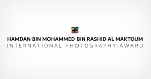 Logo of the Hamdan Bin Mohammed Bin Rashid al Maktoum International Photography Award, featuring stylized text and a colorful, geometric icon above the text.