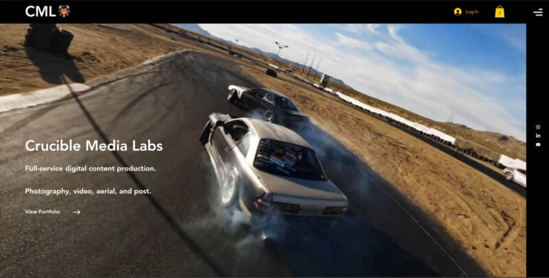 The image shows two cars drifting on a racetrack, with clouds of smoke billowing from their rear tires. a logo for crucible media labs appears in the upper left, over a scenic background.