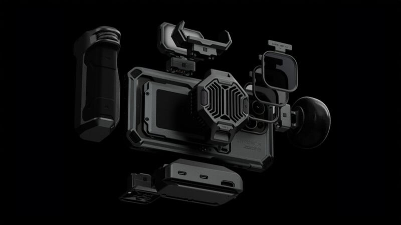 A professional modular camera system displayed against a black background, highlighting various components including lenses, battery pack, and a screen attachment.