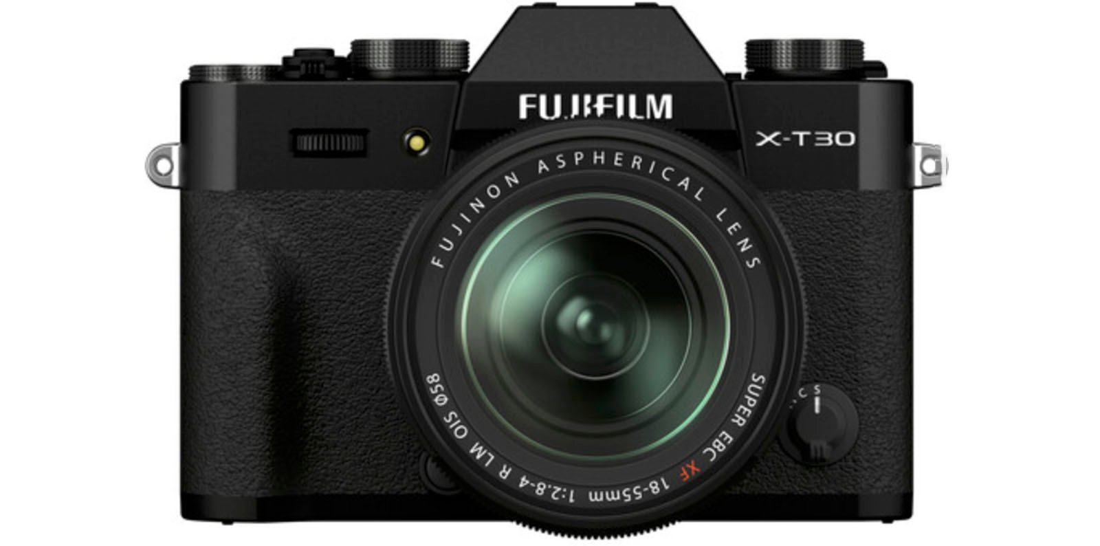 Front view of a Fujifilm X-T30 digital camera with a Fujinon Aspherical Lens. The body is primarily black, featuring various buttons and dials. The lens has text indicating its specifications: 18-55mm, 1:2.8-4 R LM OIS.