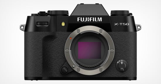 A black Fujifilm X-T50 mirrorless digital camera with a textured grip and no lens attached. The camera body features dials, buttons, and a viewfinder at the top. The Fujifilm logo and model name are prominently displayed on the front.