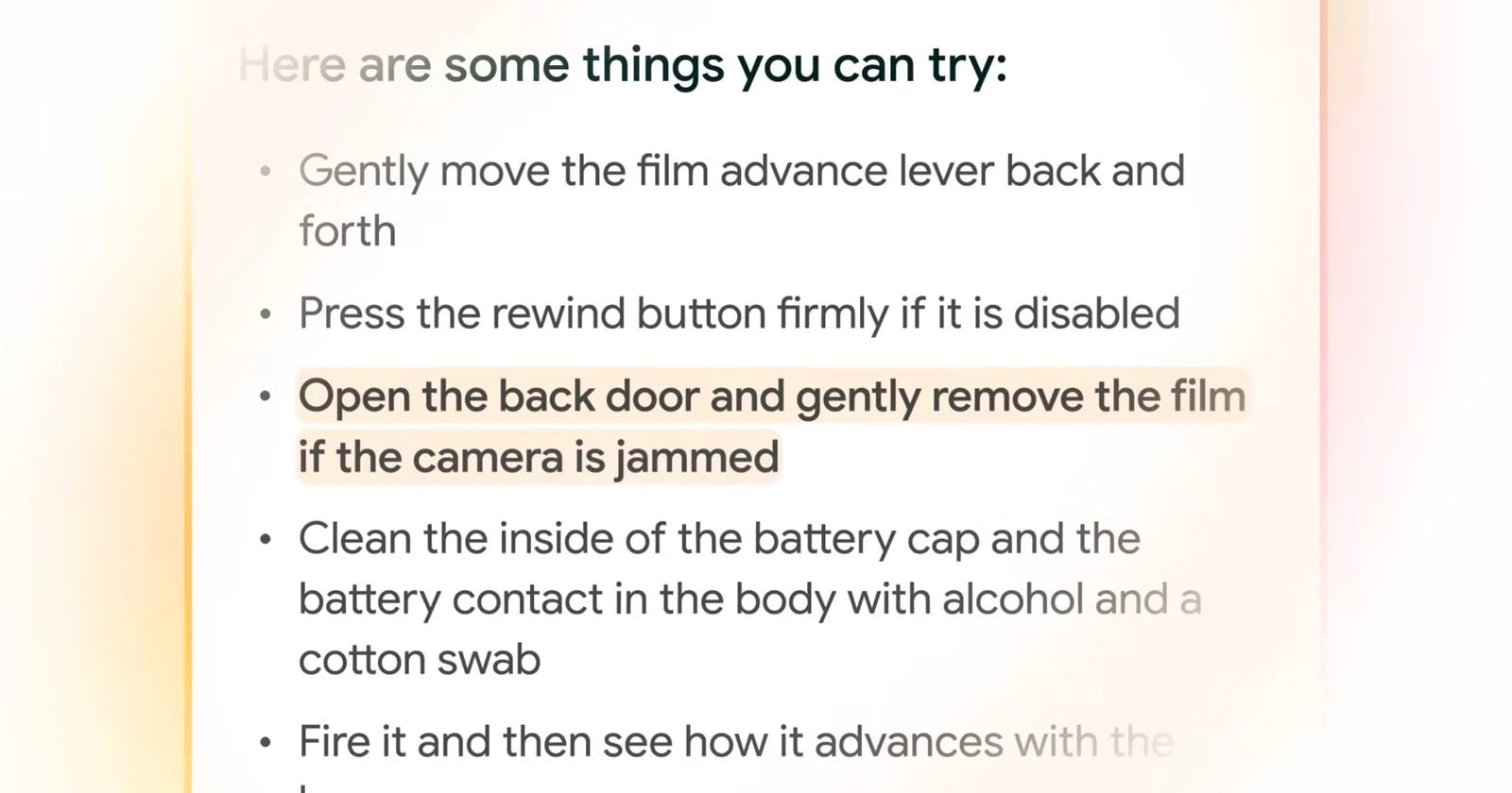 An instructional list on troubleshooting a camera. Steps include moving the film advance lever, pressing the rewind button, opening the back door to remove the film if jammed, cleaning the battery cap and contact with alcohol and a swab, and firing the camera.