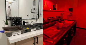 Split image of two darkroom setups. left: a modern, tidy darkroom with labeled tubs for developing film. right: a dimly lit, red-illuminated traditional darkroom with trays and chemical bottles.