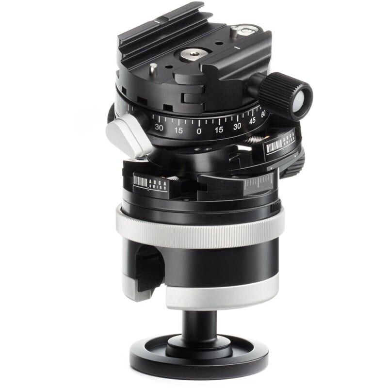 A precision geared tripod head with detailed degree markings and adjustment knobs, mounted on a black circular base.