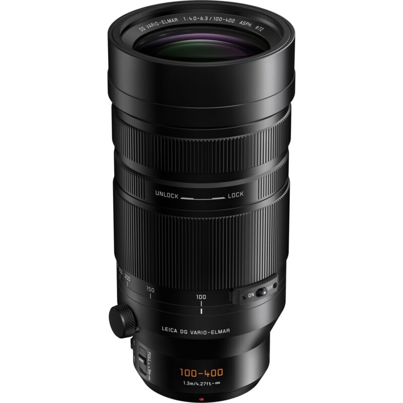 A black telephoto zoom camera lens with focal length markings from 100 to 400mm, featuring a stabilizer switch and lock/unlock zoom controls.