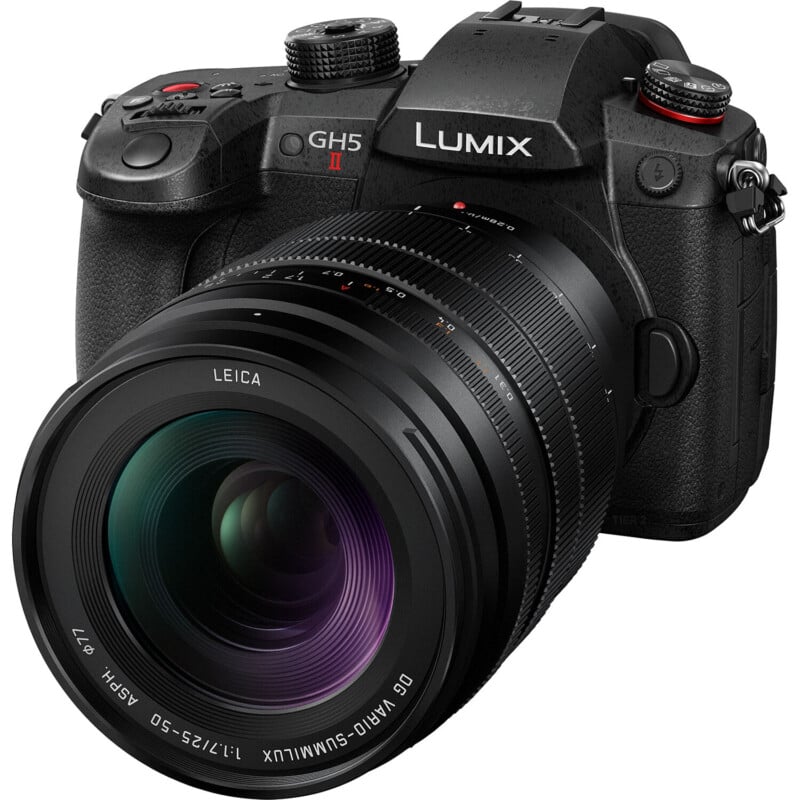 A panasonic lumix gh5 ii camera with a large leica lens attached, showcasing detailed controls and branding on the camera body.