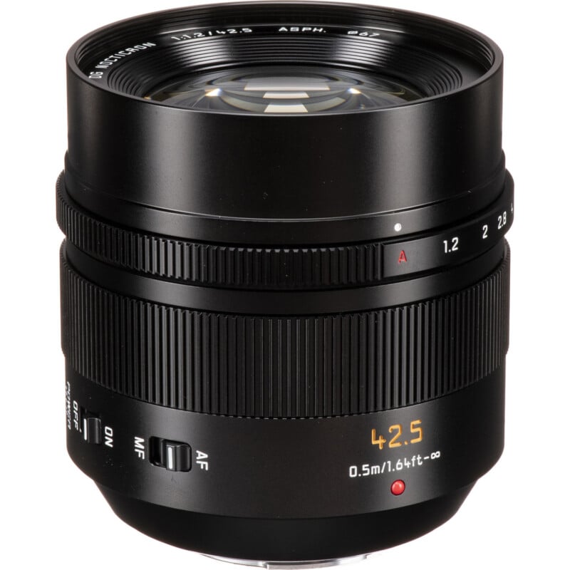 A close-up of a black 42.5mm camera lens with focus and aperture rings, and depth of field scale, indicating an f/1.2 aperture. the lens is designed for sharp and detailed photography.