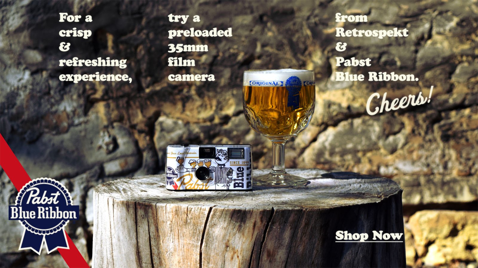 A vintage-style 35mm film camera is placed on a tree stump beside a glass of Pabst Blue Ribbon beer. The text promotes a collaboration between Retrospekt and Pabst Blue Ribbon for a preloaded film camera. The background features a serene natural setting.