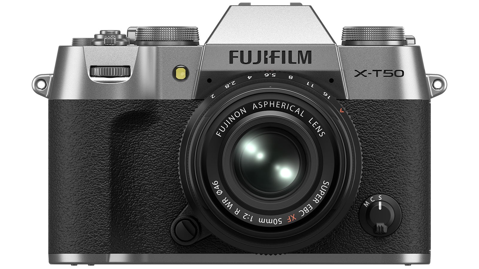 A silver and black Fujifilm X-T50 digital camera with a Fujinon Aspherical Lens is shown from the front. The camera features various buttons and dials for settings, and the lens has detailed markings and a bright reflective surface.