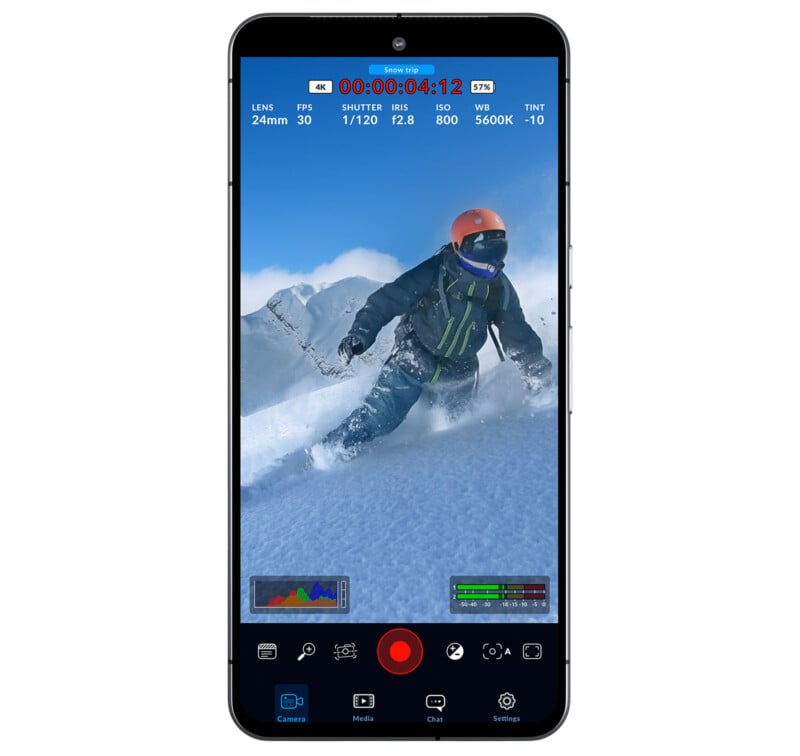 A smartphone screen displaying a video recording interface shows a person skiing downhill on a snowy mountain. The skier is equipped with winter gear, including a helmet and goggles. A red recording button is visible alongside various video settings and controls.