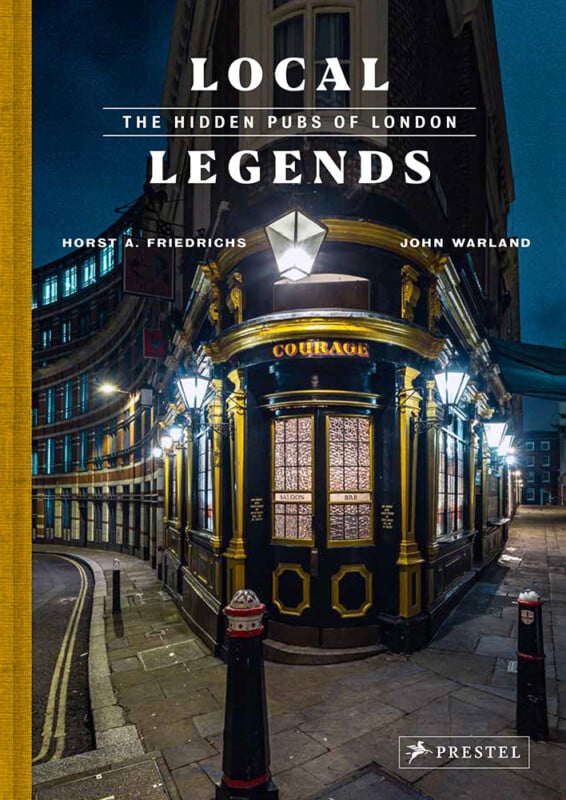Book cover titled "Local Legends: The Hidden Pubs of London" by Horst A. Friedrichs and John Warland. The cover features a vibrant night-time photo of a traditional London pub on a corner, illuminated by street lamps, with "Courage" written above the door.