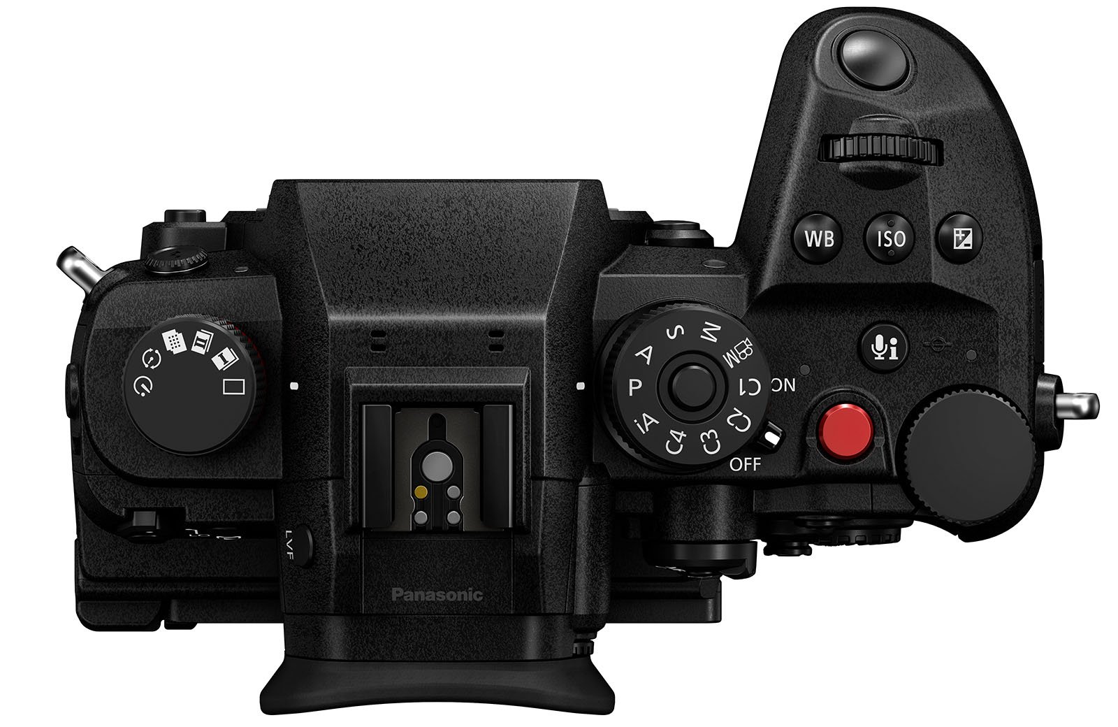 Top view of a black Panasonic Lumix camera, showing various control dials and buttons. Notable controls include a large mode dial, a red record button, a joystick, a shutter button, a white balance button, and an exposure compensation dial.