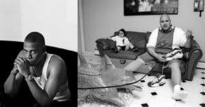 On the left, a man in a white tank top sits with his hands clasped, looking thoughtful. On the right, a man sits on a couch with a baby beside him. He is holding a sneaker. The room has a tiled floor and a glass table with a dolphin base.