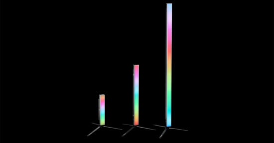 Three LED light bars of varying heights are displayed against a black background. Each bar emits a colorful gradient light, showcasing shades of pink, blue, and green, and has a minimalist, modern design with tripod-like bases.