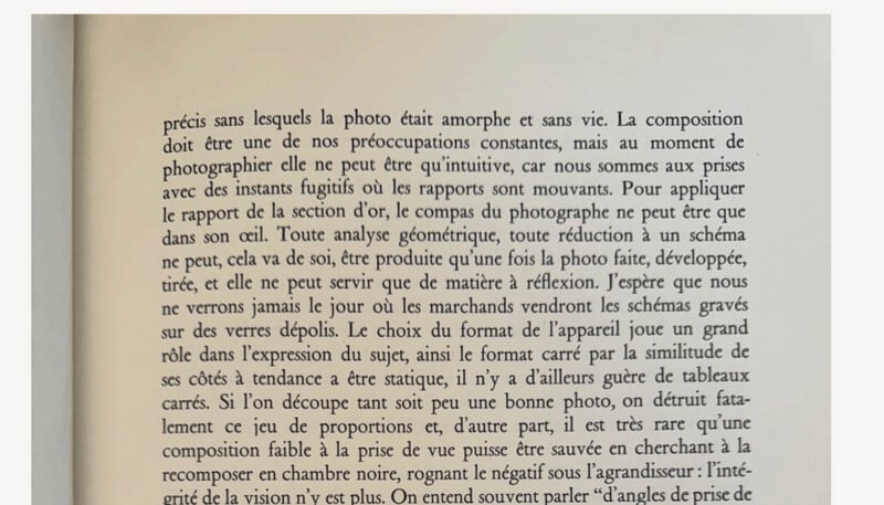 A close-up image of a page from a book. The language is French and the text discusses aspects of photography and the importance of composition, geometry, and expression when taking a photo. The text appears well-formatted with readable, black serif font on white paper.