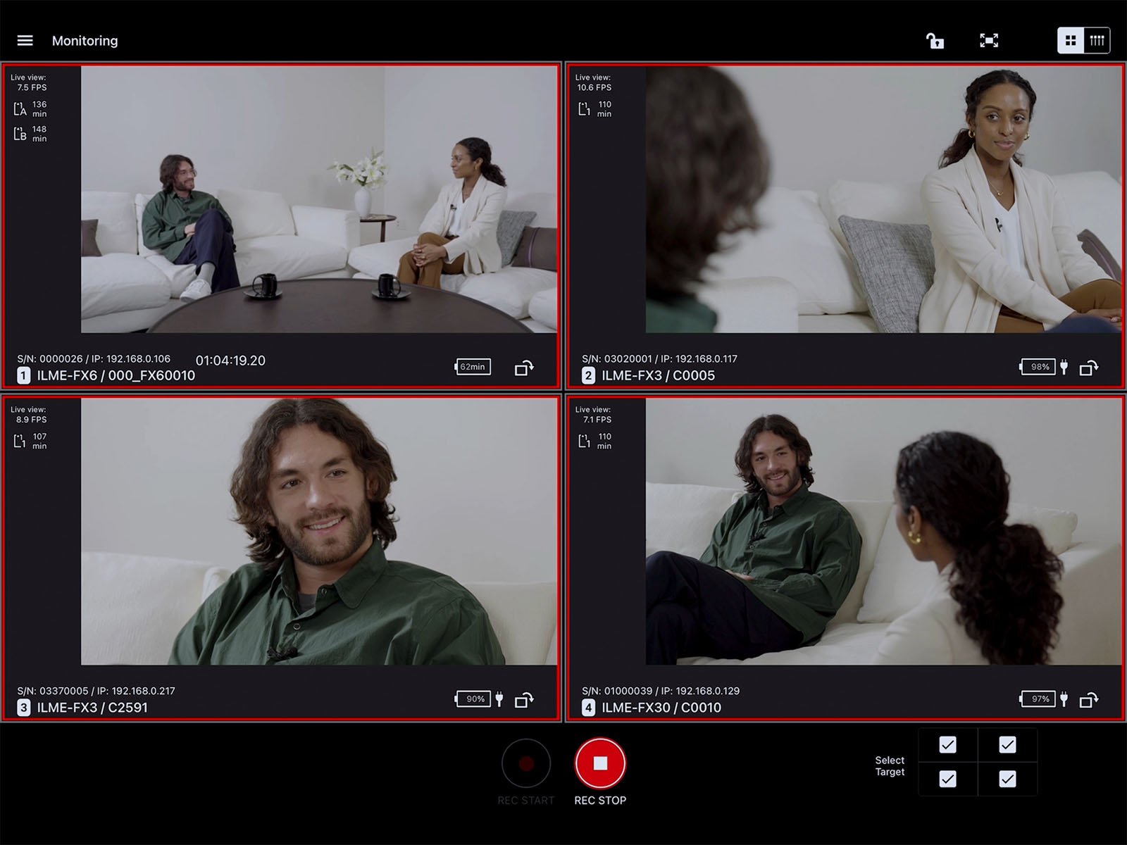 A split-screen view of a video call monitoring interface showing two people having a conversation. The top left and bottom right frames show them seated on a couch, while the bottom left and top right frames provide closer shots of each person. Interface controls are visible.
