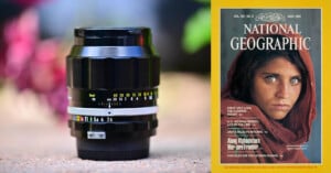 On the left, a close-up shot of a camera lens with a blurred background. On the right, a June 1985 National Geographic magazine cover featuring a young woman with striking eyes, wrapped in a red shawl. The background of the cover is yellow.