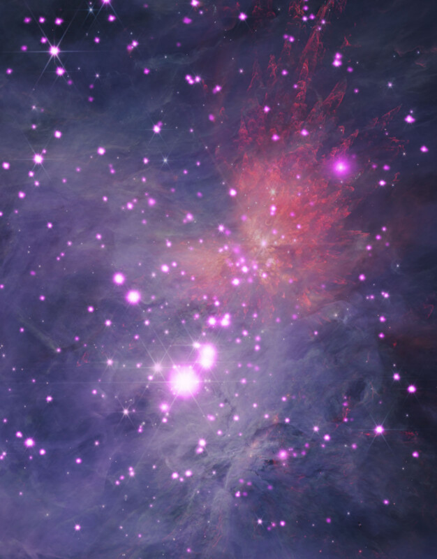 This image of deep space features a colorful nebula with purples, blues, and reds, adorned with numerous bright, twinkling stars scattered throughout. A bright pink light glows at the center, surrounded by wisps of cosmic dust and gas.