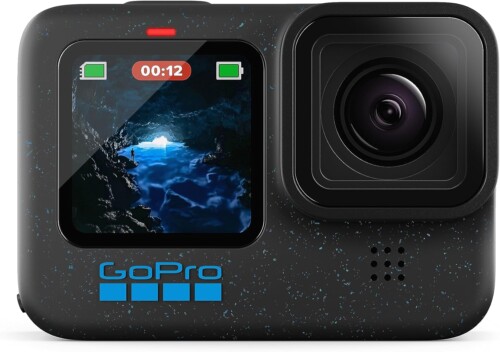 A close-up of a GoPro action camera with two screens. The front screen shows an image of a cave opening with water and light pouring in. The camera has a black speckled body with a GoPro logo at the bottom. The recording timer on the screen displays 00:12.