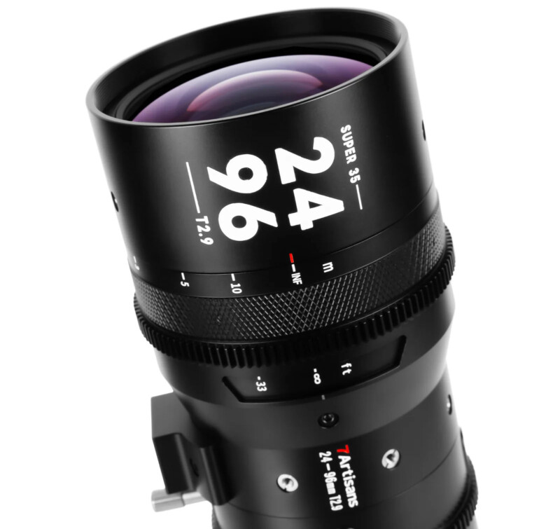 Close-up of a black 7Artisans camera lens. The lens shows the focal range of 24-96mm and an aperture of T2.9. The lens has a knurled zoom ring and focusing ring with distance markers. The text "Super 35" is also visible. The lens appears to be angled slightly upwards.