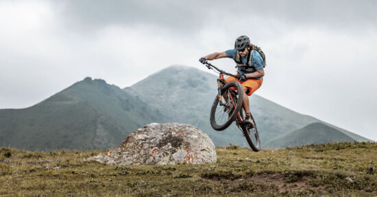 A man riding a bike in the air.