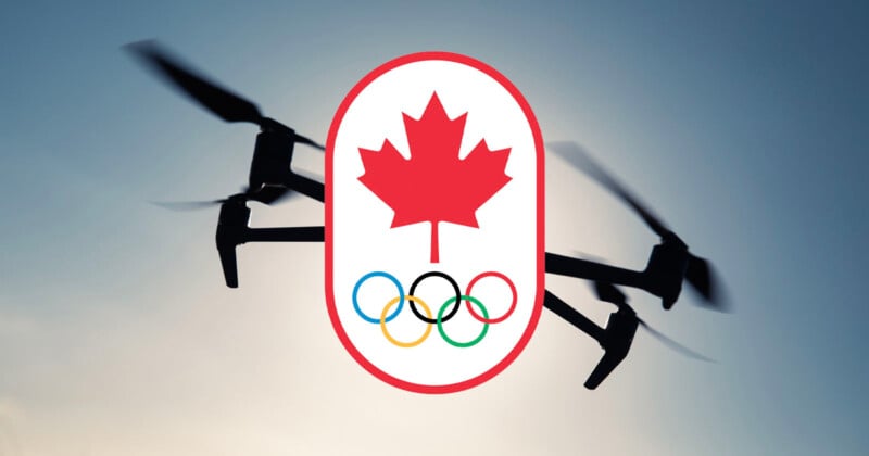 A drone in flight is silhouetted against a sky background. Superimposed over the drone is an emblem featuring a red maple leaf above the five interlocking Olympic rings, symbolizing the Canadian Olympic team.