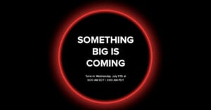 A black background with a glowing red ring around the text "Something Big is Coming." Below, it says "Tune in Wednesday, July 7th at 6:00 AM EDT | 3:00 AM PDT.