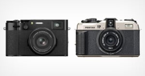 Two cameras are displayed. On the left is a Fujifilm X100V with a black body and labeled "Fujinon Aspherical Lens" around the lens. On the right is a vintage Pentax 17 film camera with a silver and black body, featuring "Auto Takumar" text around its lens.
