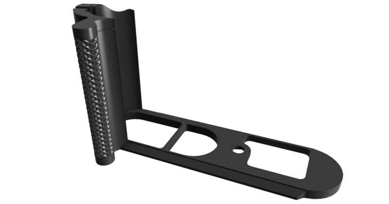 A black L-shaped camera grip bracket with a textured handle on the vertical side and cut-out sections on the horizontal base. The bracket features multiple mounting holes for attaching to a camera or tripod.