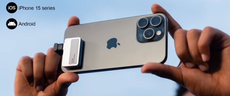 A person is holding an iPhone 15 horizontally with a small white device attached to the back near the camera. The iOS logo with "iPhone 15 series" and the Android logo are displayed on the left side of the image against a light blue sky background.