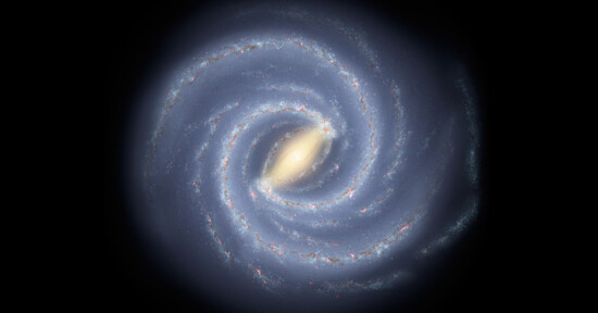 A vibrant artistic depiction of a spiral galaxy. The galaxy features a bright, glowing core with extensive swirling arms, showcasing a gradient of blue, white, and hints of red, set against a dark background. The arms are filled with stars and cosmic dust.
