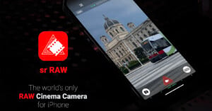 A smartphone screen displaying a camera app interface with a photo of a tram and a classical-style building in the background. Text reads "The world's only RAW Cinema Camera for iPhone" alongside a red logo with film reel graphics and the text "sr RAW.