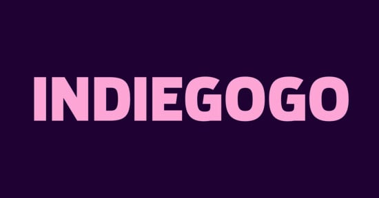 The image displays the word "INDIEGOGO" in bold, uppercase pink letters against a dark purple background.