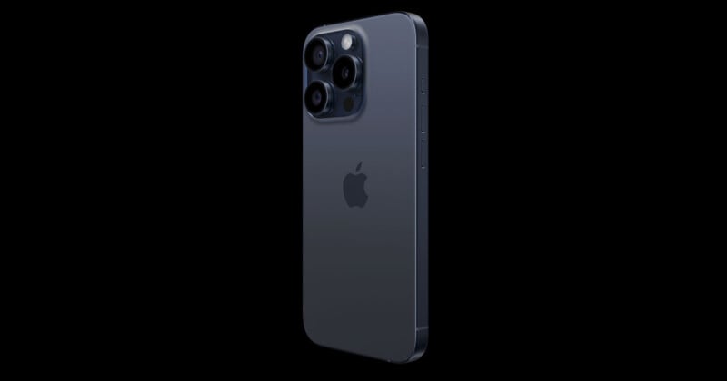 A sleek, modern smartphone with a dark metallic finish displayed on a black background. It features a triple-lens rear camera setup and the iconic Apple logo in the center. The device has a flat-edged design with discrete side buttons.