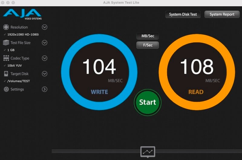 A screenshot of a disk speed test from AJA System Test Lite. The write speed is 104 MB/sec, and the read speed is 108 MB/sec. The left panel shows settings including resolution, test file size, and codec type. The right side has buttons for disk test and system report.