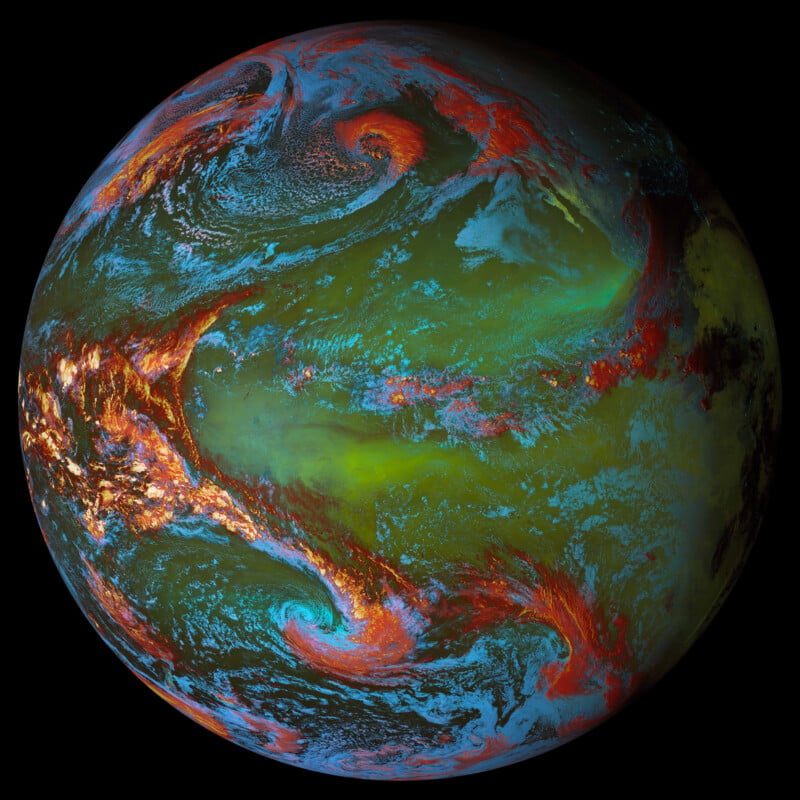 A vividly colored enhanced image of Earth shows swirling clouds and weather patterns in striking shades of red, blue, green, and yellow. The exaggerated colors highlight atmospheric circulation and other meteorological features against the black background of space.