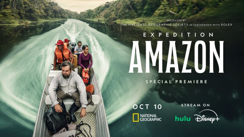 A group of people in life vests are riding in a motorboat on a river surrounded by dense, green forest. The text on the image reads: "Expedition Amazon. Special Premiere Oct 10. National Geographic. Stream on Hulu and Disney+.