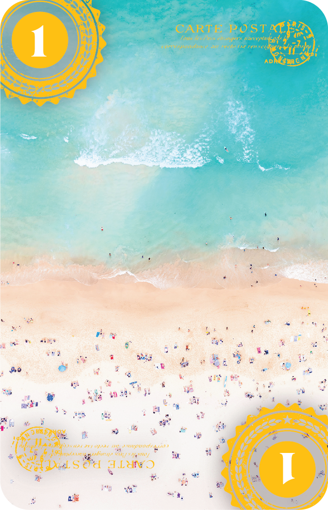 Aerial view of a crowded beach with turquoise waters, light sand, and many colorful umbrellas and beachgoers. The image has a vintage postcard feel with decorative golden postal stamps in the top left and bottom right corners.