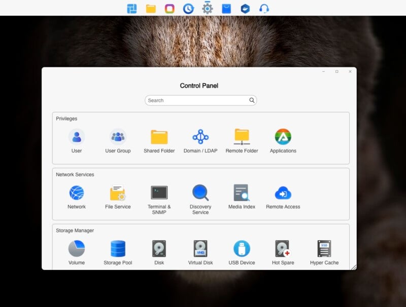 A computer screen displaying a control panel interface. The interface has sections for Privileges, Network Services, and Storage Manager. Icons include User, User Group, Shared Folder, Applications, Network, File Service, Terminal & SNMP, Volume, and more.