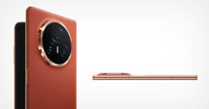 Close-up of a modern smartphone with a textured brown leather back and a large, circular, multi-lens camera module with gold accents. The device is shown from the back and side, highlighting its slim profile and elegant design.