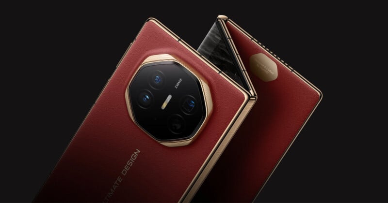 A close-up of a luxury smartphone with a foldable design. The rear side shows a red leather finish with gold edges and a multi-lens camera module in a striking octagonal shape. The phone is partially unfolded, displaying its detailed build and premium materials.