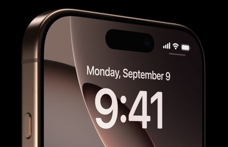 41. The iPhone is shown in a dark setting with a focus on the front camera area and neatly rounded edges of the screen. The device signal and battery icons are visible.