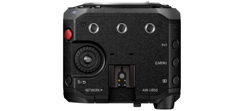 The image shows the rear view of a compact black camera with various controls and ports. It features three buttons on the right, a red button on the top left, a round menu/reset dial on the left, and a connector for Sony accessories labeled "AW-UE50" at the bottom.